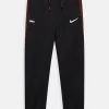 Nike Performance FC LIBERO PANT - Jogginghose - Black | Unisex