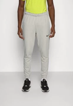 Nike Performance Herren PANT TAPER - Jogginghose - Light Stone/black