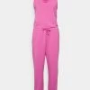 Nike Performance JUMPSUIT TIE - Trainingsanzug - Cosmic Fuchsia/iron Grey | Damen