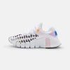 Nike Performance Damen FREE METCON 4 - Trainingsschuh - Black/yellow Strike/white/racer Blue/regal Pink/total Orange
