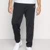 Nike Performance HERITAGE SUIT PANT - Jogginghose - Black | Herren