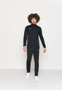 Nike Performance Herren ACADEMY TRACKSUIT - Trainingsanzug - Black/saturn Gold