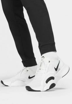 Nike Performance PANT TAPER - Jogginghose - Black/white | Herren -Angebote Nike Store 21b579ca6a5945ddb1fcde48c89ed80c