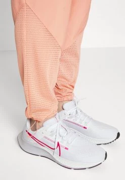 Nike Performance Damen RUN PANT - Jogginghose - Madder Root -Angebote Nike Store 28eff2d025224978a5080b27777004a1