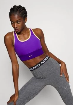 Nike Performance Damen BRA - Sport-BH Mit Mittlerer Stützkraft - Psychic Purple/electro Purple/melon Tint -Angebote Nike Store 2e771b4bdcd742f9a3b815d502668b7a