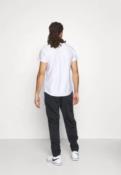 Nike Performance HERITAGE SUIT PANT - Jogginghose - Black | Herren -Angebote Nike Store 300eec9348a241bfb96b07781138f7a8