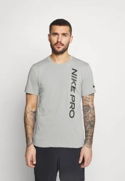 Nike Performance BURNOUT - T-Shirt Print - Particle Grey/black | Herren