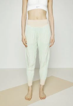 Nike Performance Damen Jogginghose - Sanddrift/mint Foam/grey Fog