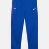 Nike Performance FC LIBERO PANT - Jogginghose - Game Royal/habanero Red/white | Unisex