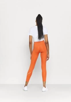 Nike Performance Damen NIKE ONE 7/8 - Tights - Light Sienna/white -Angebote Nike Store 3f674953c994486e90dae17bd928b8bd