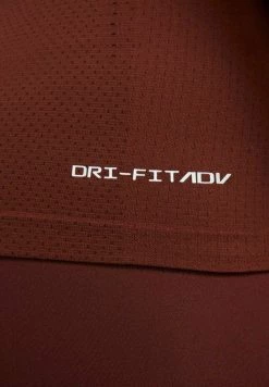 Nike Performance Damen AURA SLIM - Sport T-shirt - Bronze -Angebote Nike Store 426065a28ec740608ccbe5229a7e3c13