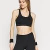 Nike Performance BRA - Sport-BH Mit Mittlerer Stützkraft - Black/dark Smoke Grey | Damen