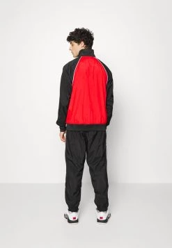 Nike Performance Herren NBA CHICAGO BULLS TRACKSUIT - Vereinsmannschaften - University Red/black/white -Angebote Nike Store 60e882af96564867ac7ac7ca69cf7ed9