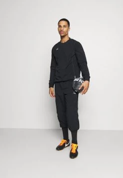 Nike Performance FC CUFF PANT - Jogginghose - Black/white/silver | Herren -Angebote Nike Store 75e71dff49f245789f40b10db1d0219e