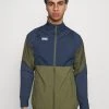 Nike Performance Herren Trainingsjacke - Medium Olive/thunder Blue/clear
