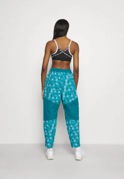 Nike Performance Damen PANT - Jogginghose - Bright Spruce/cave Purple/gold -Angebote Nike Store 876844ef08ec4c7295f6c279bfb5f808