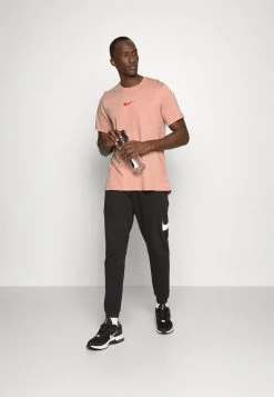 Nike Performance BURNOUT - Sport T-shirt - Rose Whisper/atmosphere/siren Red | Herren -Angebote Nike Store 8d34c2ce5aba4bf49a6ca1958079eefc