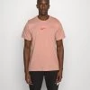 Nike Performance BURNOUT - Sport T-shirt - Rose Whisper/atmosphere/siren Red | Herren
