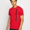 Nike Performance Herren BURNOUT - T-Shirt Print - University Red/black