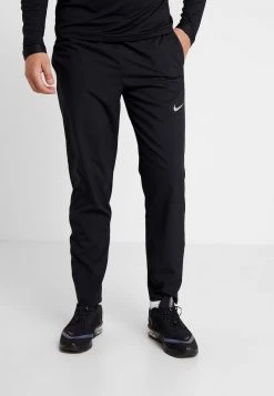 Nike Performance Herren RUN STRIPE PANT - Jogginghose - Black/silver