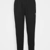Nike Performance STANDARD ISSUE PANT - Jogginghose - Black/pale Ivory | Damen