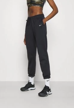Nike Performance THERMA FIT ALL TIME - Jogginghose - Black/white | Damen