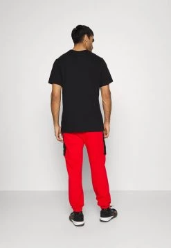 Nike Performance NBA CHICAGO BULLS MOMENTS MIXTAPE PANT - Vereinsmannschaften - University Red/black | Herren -Angebote Nike Store ad7954b48f874aa1bcaec531b899f758