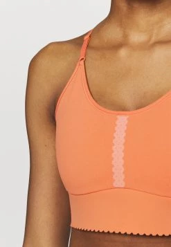 Nike Performance Damen INDY EYELET BRA - Sport-BH Mit Leichter Stützkraft - Apricot Agate/arctic Orange -Angebote Nike Store b296c1484dc244b2be8eeae91c0203a8