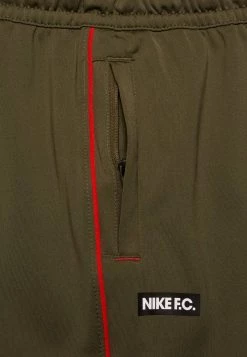 Nike Performance Unisex FC LIBERO PANT - Jogginghose - Medium Olive/habanero Red/white -Angebote Nike Store b2fc788c4d924bfb8ba25e4bca143e88