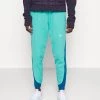 Nike Performance Damen Jogginghose - Washed Teal/marina
