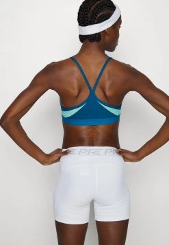 Nike Performance Damen INDY V NECK BRA - Sport-BH Mit Leichter Stützkraft - Marina/washed Teal/marina/white -Angebote Nike Store c9d40505b44647fe8924ba798036ddae