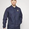 Nike Performance CHELSEA LONDON COACH - Vereinsmannschaften - Blackened Blue/jersey Gold | Herren