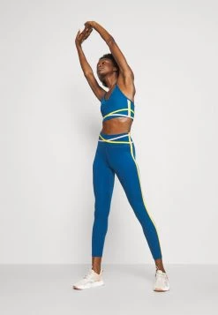 Nike Performance Damen INDY BRA - Sport-BH Mit Leichter Stützkraft - Court Blue/pink Glaze/university Gold/white -Angebote Nike Store cb8494bad5e44c0bbec4ee973c000906