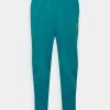 Nike Performance HERITAGE SUIT PANT - Jogginghose - Bright Spruce/white | Herren